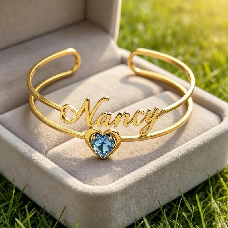 The Birthstone Charm Bangle presented in a gift box, ready for a special occasion.
