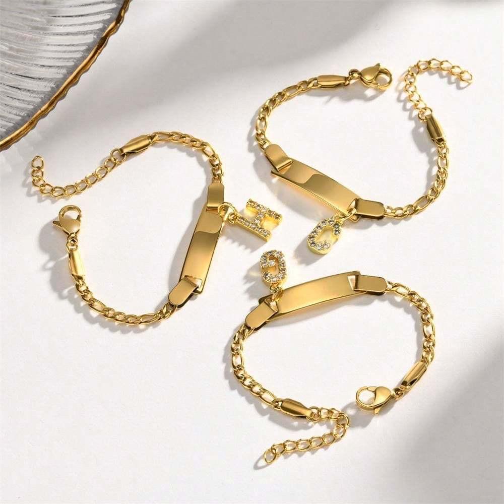 Close-up of the gold Signature Letter Bracelet showcasing its letter charm detail.
