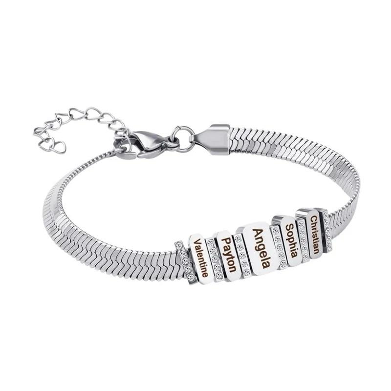 Silver Forever Family Bracelet featuring the names of family members on its charms.
